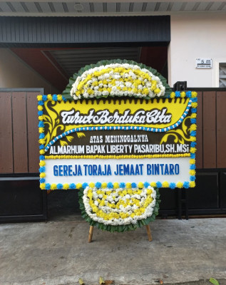 Papan Bunga Duka di Tifure