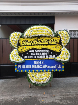 Papan Bunga Duka di Tifure