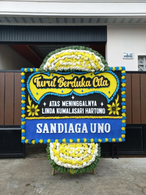 Papan Bunga Duka di Tifure